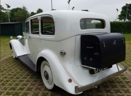 White vintage Rolls Royce in London